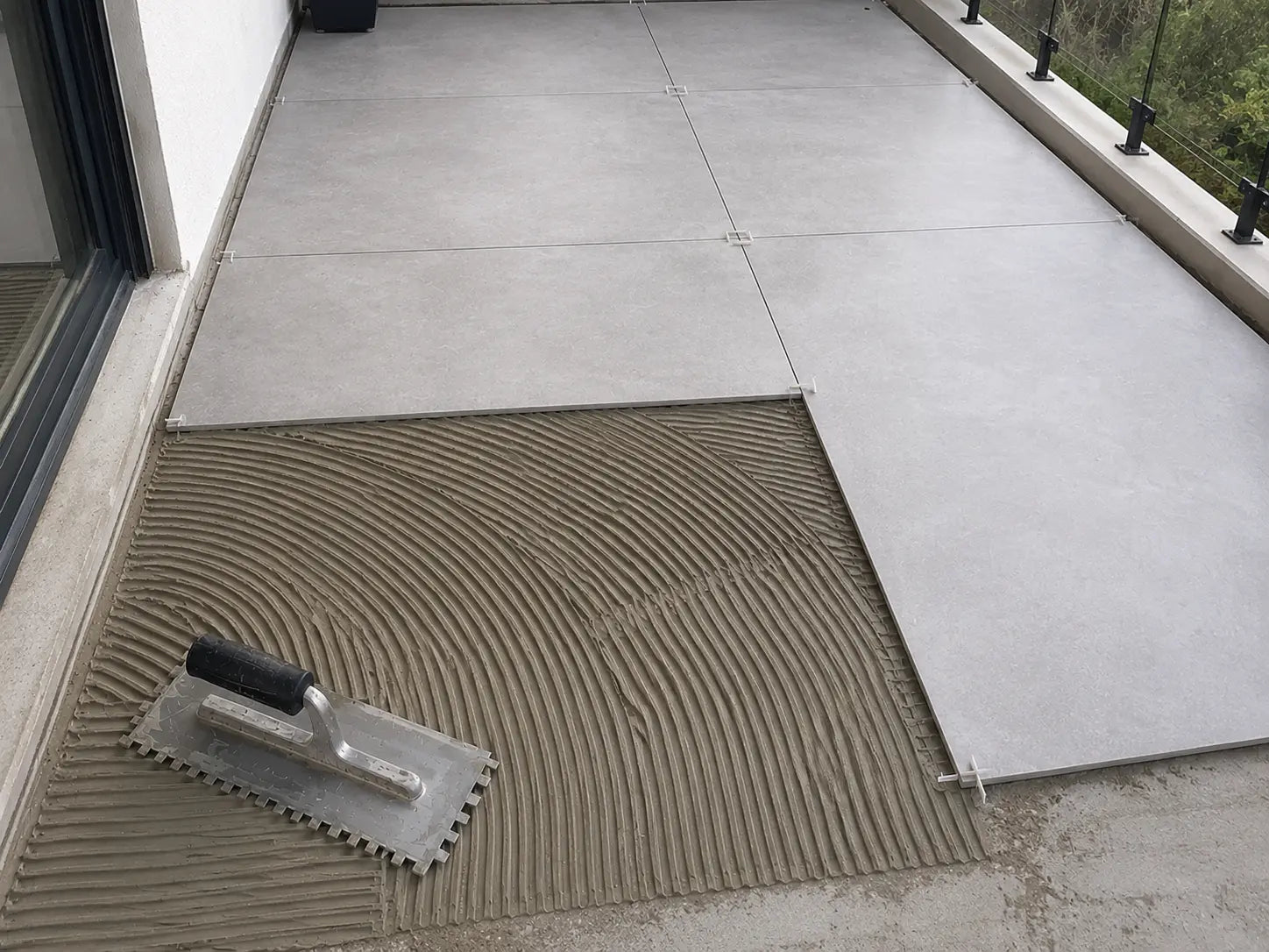 What is the best tile adhesive for outdoor use?